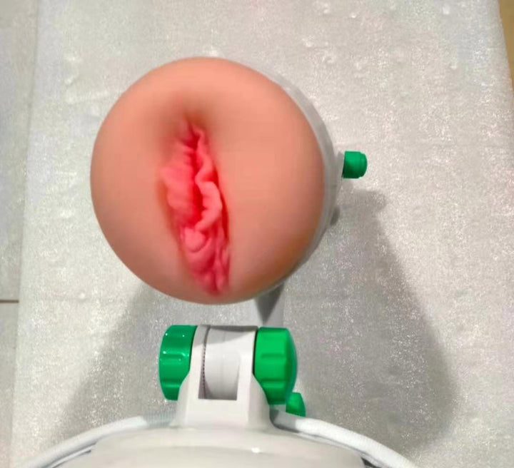 Medical device with a pink and red component on a white background