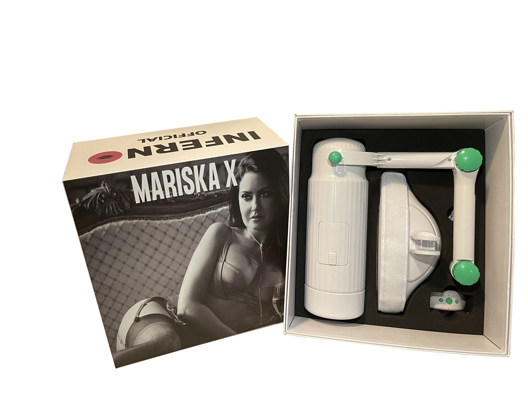 The product image shows the Mariska X Milker GL-J001 Automatic Masturbator, which is packaged in a white box with a black inner lining. The masturbator is displayed next to its packaging, featuring a sleek, grey cylindrical device with green accents.