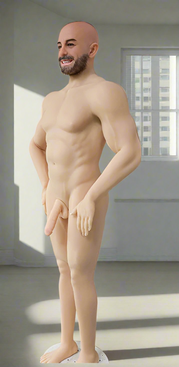 This image features the Steven Barrett Doll, a highly detailed and realistic male silicone doll. The doll stands upright with a confident posture, showcasing his muscular build and human-like skin texture.
